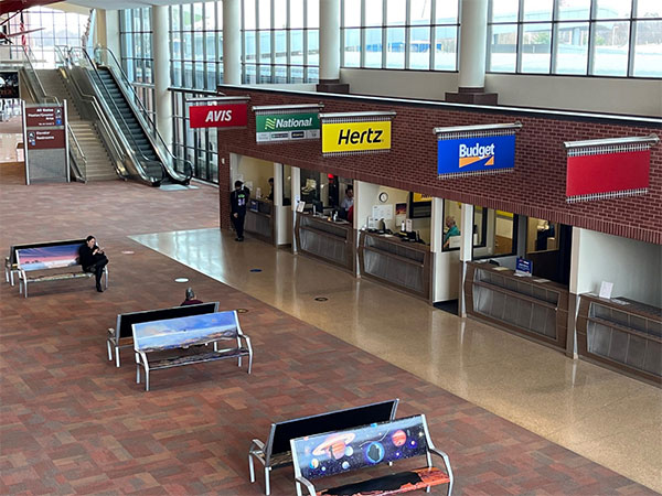 A photograph of the car rental area inside of Kalamazoo/Battle Creek International Airport.